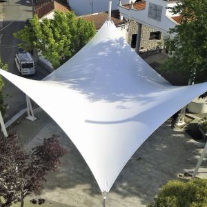 tensile cover with the shape of a hyperbolic paraboloid that covers the square of the town hall of N